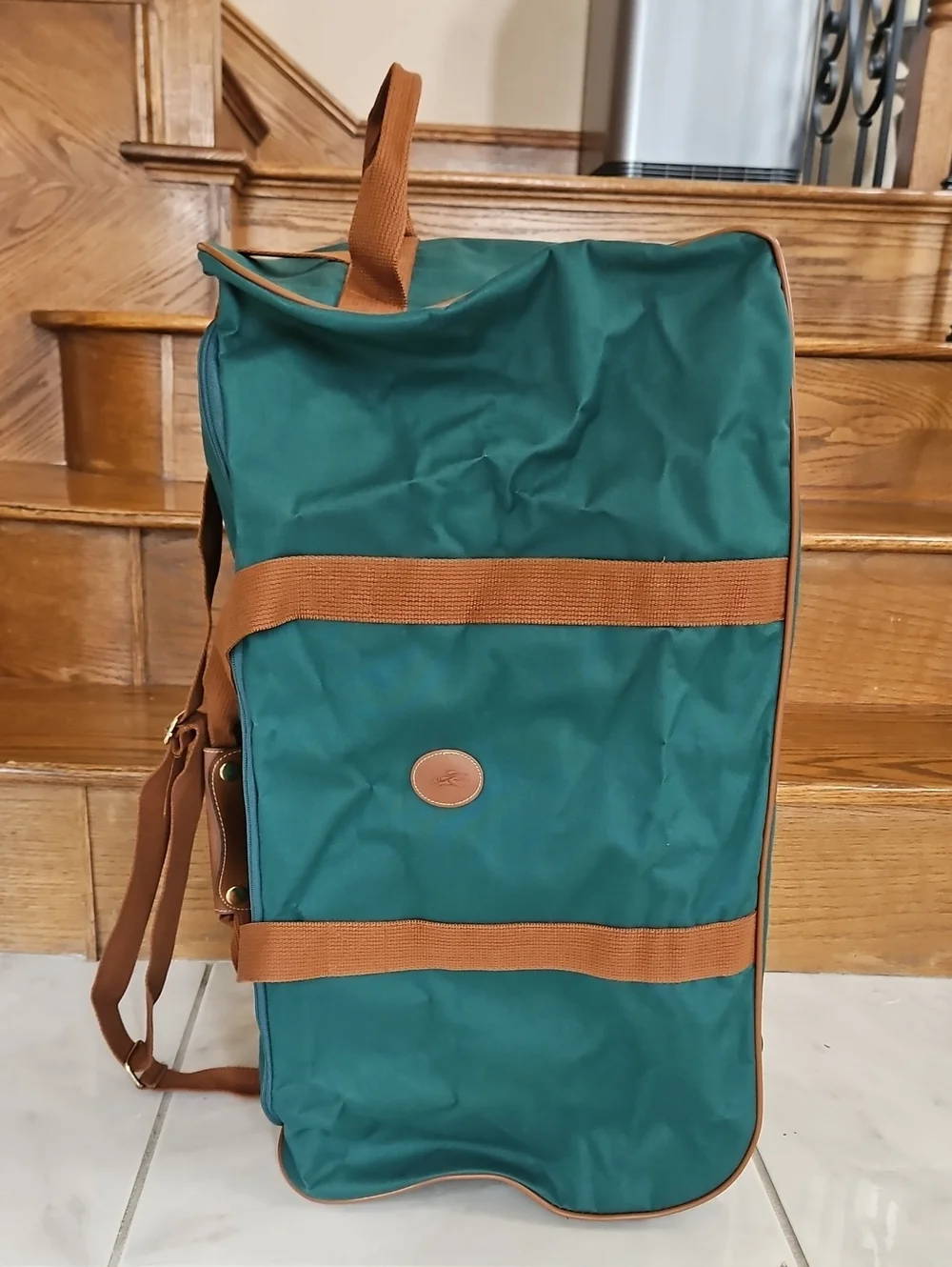 Vntage Polo Ralph Lauren hunter green canvas duffel bag features brown web